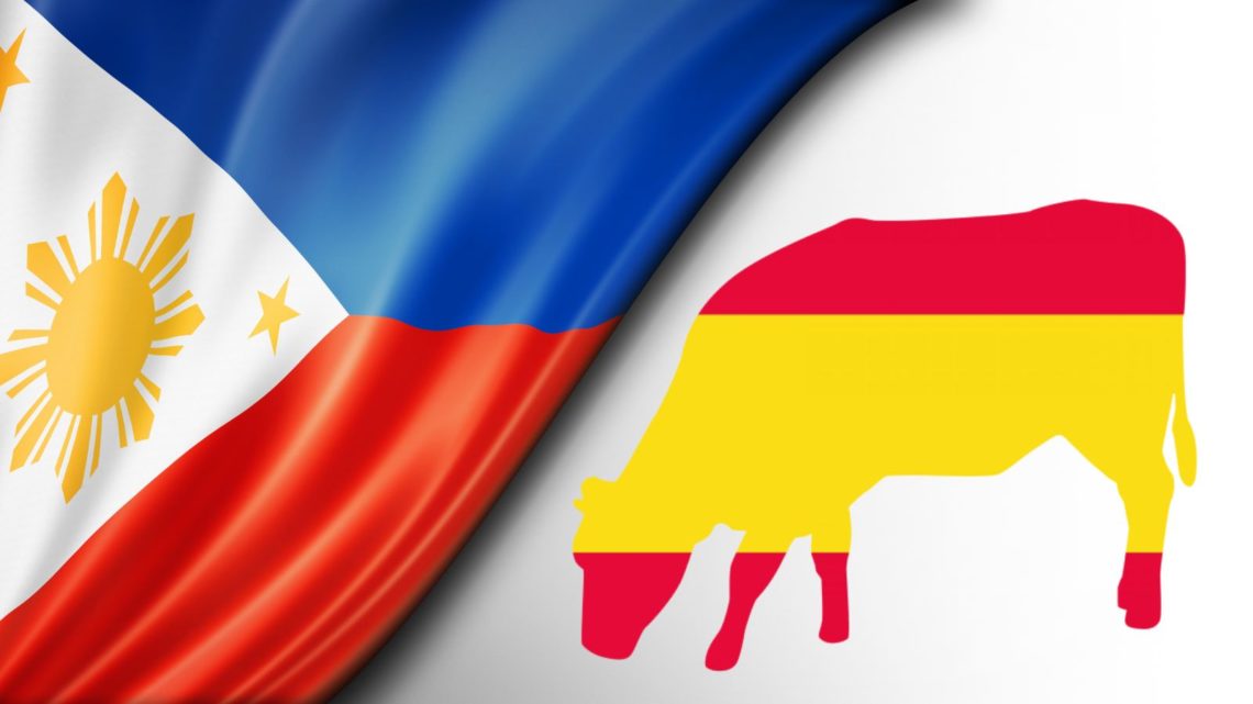 bandera filipinas y silueta vaca con bandera española